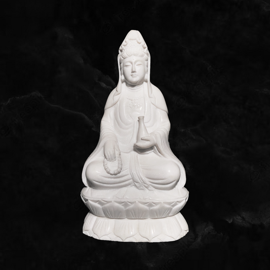 Kuan-Yin sitting on a lotus