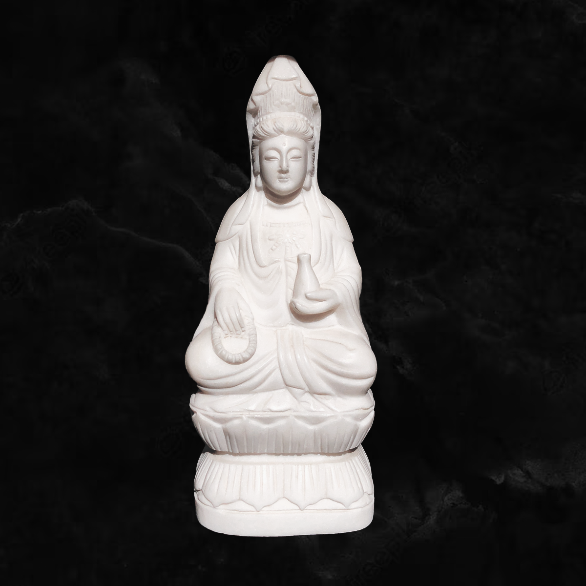 Kuan-Yin sitting on a lotus