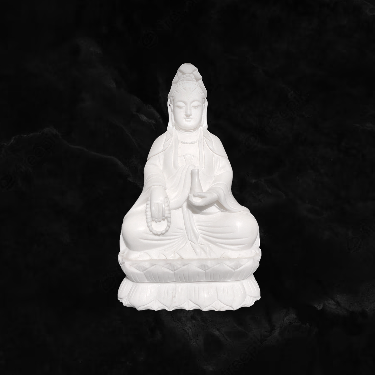 Kuan-Yin sitting on a lotus